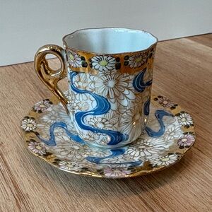 River painted Téa cup and plate, plate is 4.7” diameter, cup is 2” diameter.